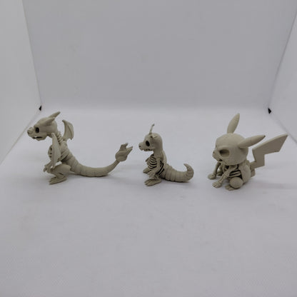 PROMO POKÉMON ESQUELETO